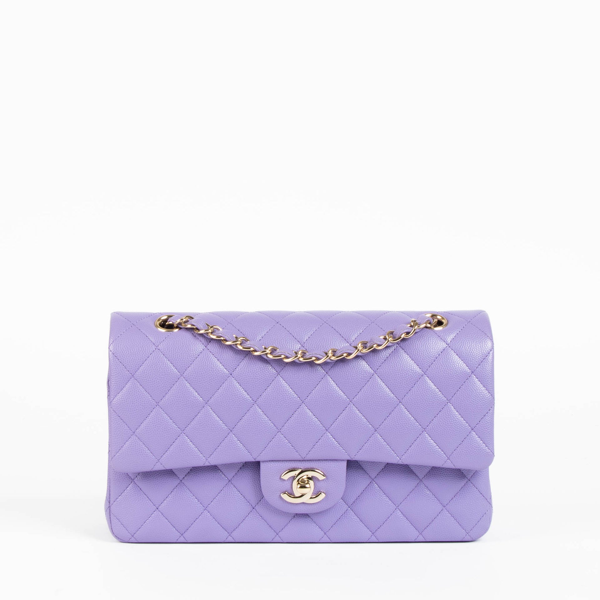 Shop this 100% authentic Chanel Purple Caviar Medium Classic 11.12 Handbag at Labellov.com