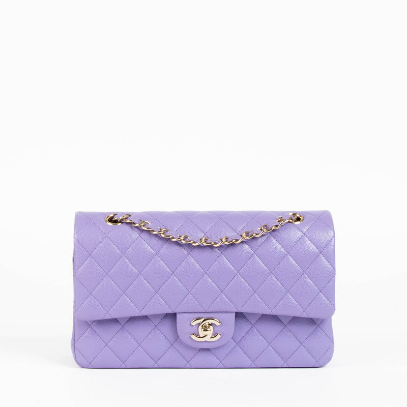 Shop this 100% authentic Chanel Purple Caviar Medium Classic 11.12 Handbag at Labellov.com