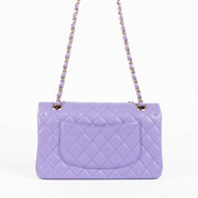 Shop this 100% authentic Chanel Purple Caviar Medium Classic 11.12 Handbag at Labellov.com
