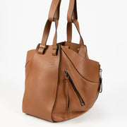 Shop the authentic Loewe Tan Medium Hammock Bag second hand on Labellov.com