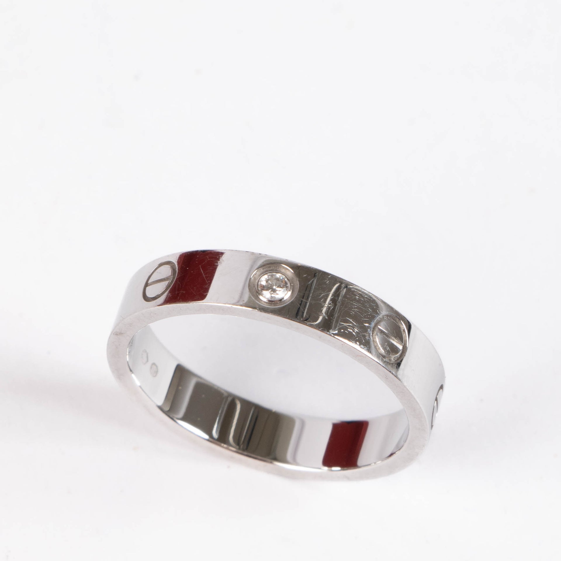 Shop this 100% authentic Cartier White Gold Love Ring Small Model 1 Diamond at Labellov.com.