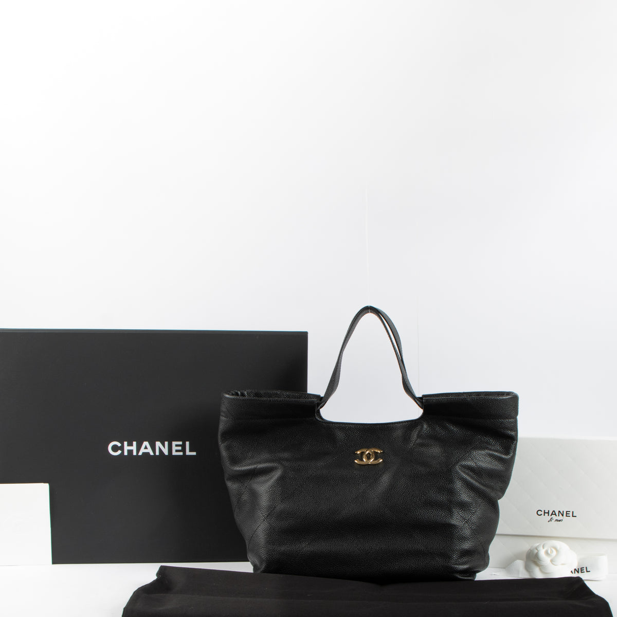 Shop this authentic Chanel 26P Black Soft Caviar CC Small Shoppping Bag pre-loved on Labellov.com