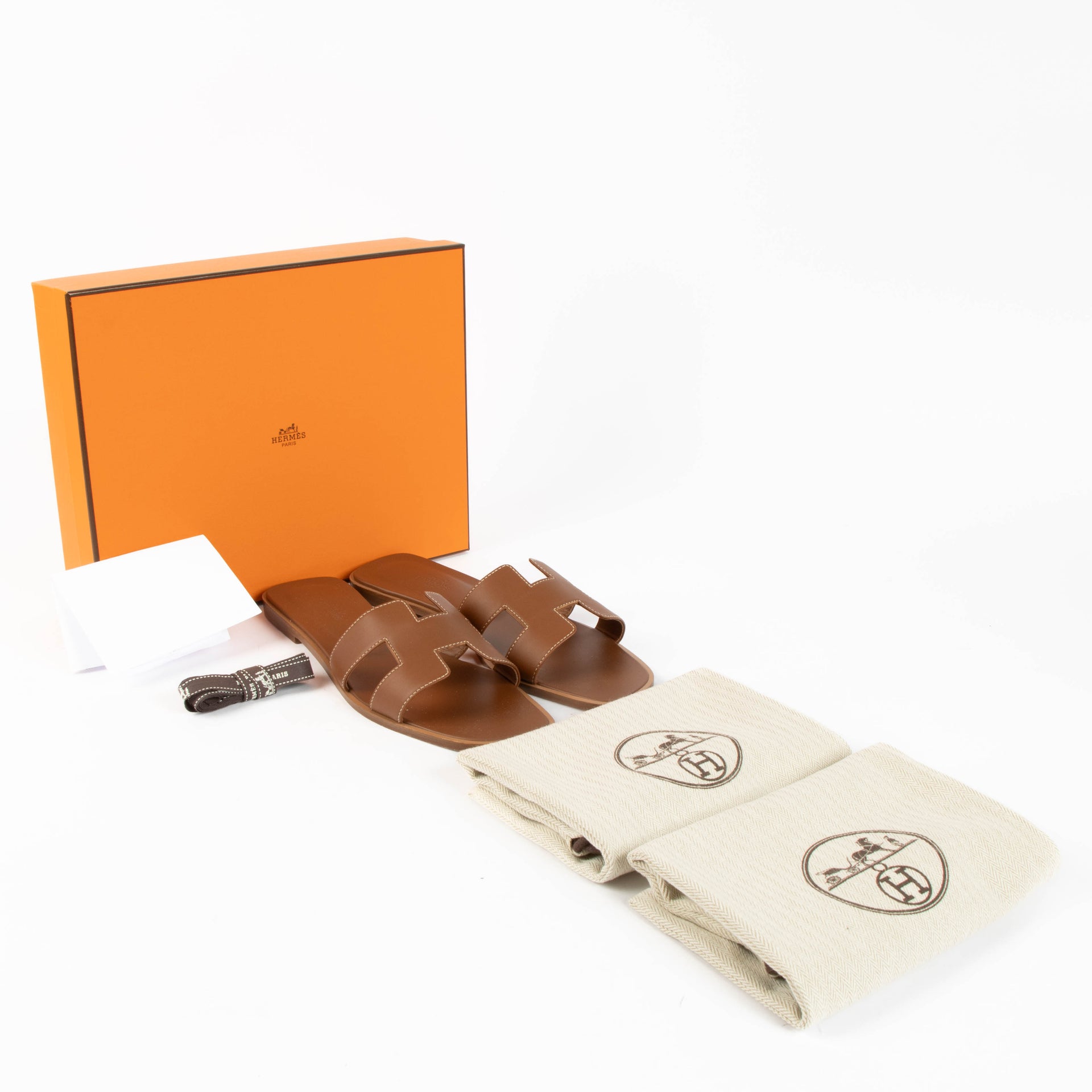 Sandales Hermès Oran en cuir doré - Taille 39,5