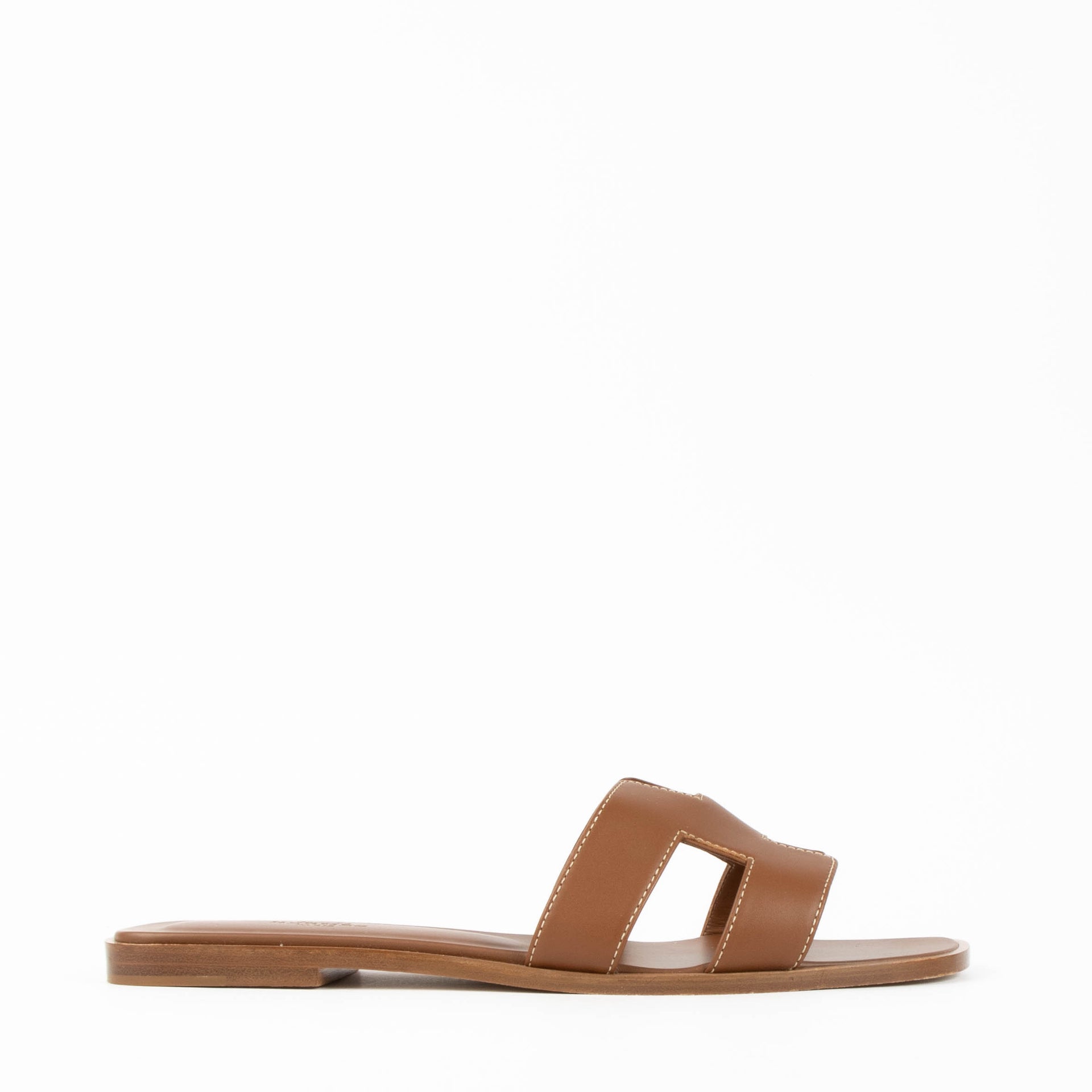 Shop this 100% authentic Hermès Gold Box Oran Sandals at Labellov.com
