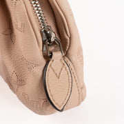 Shop the authentic Louis Vuitton Pink Mahina Scala Mini Pouch on Labellov.com