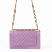 Shop this 100% authentic Chanel Boy Medium Purple Caviar Bag at Labellov.com