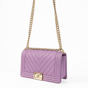Shop this 100% authentic Chanel Boy Medium Purple Caviar Bag at Labellov.com