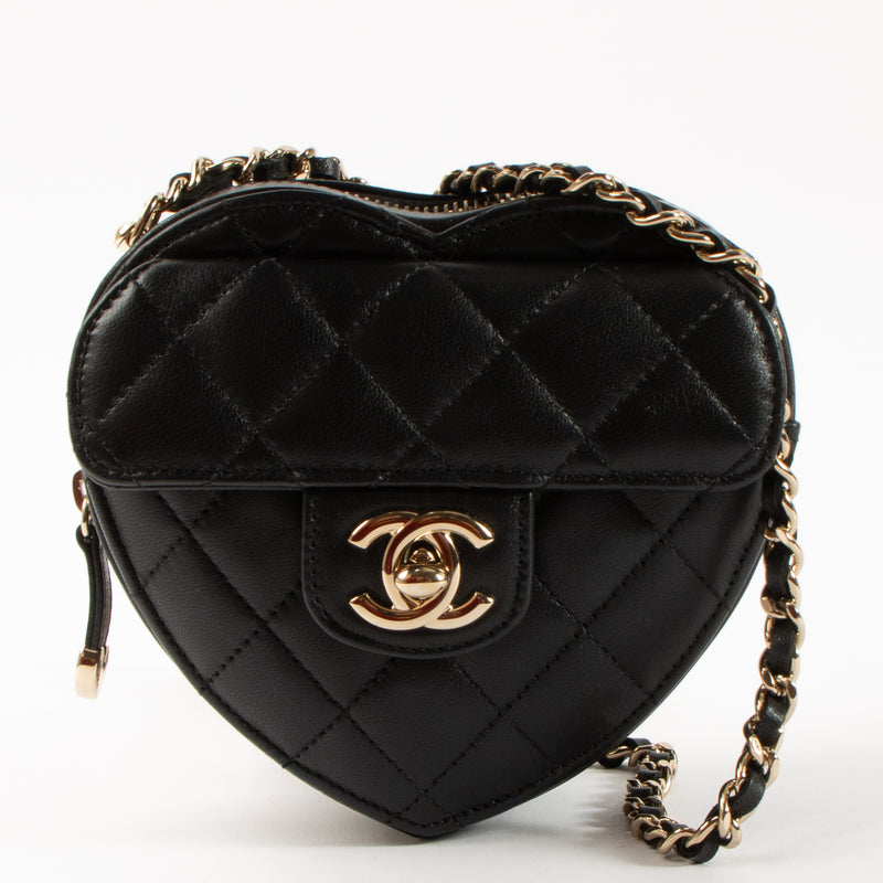 Shop this authentic Chanel Black Quilted Lambskin CC In Love Heart Clutch With Chain pre-loved on labellov.com