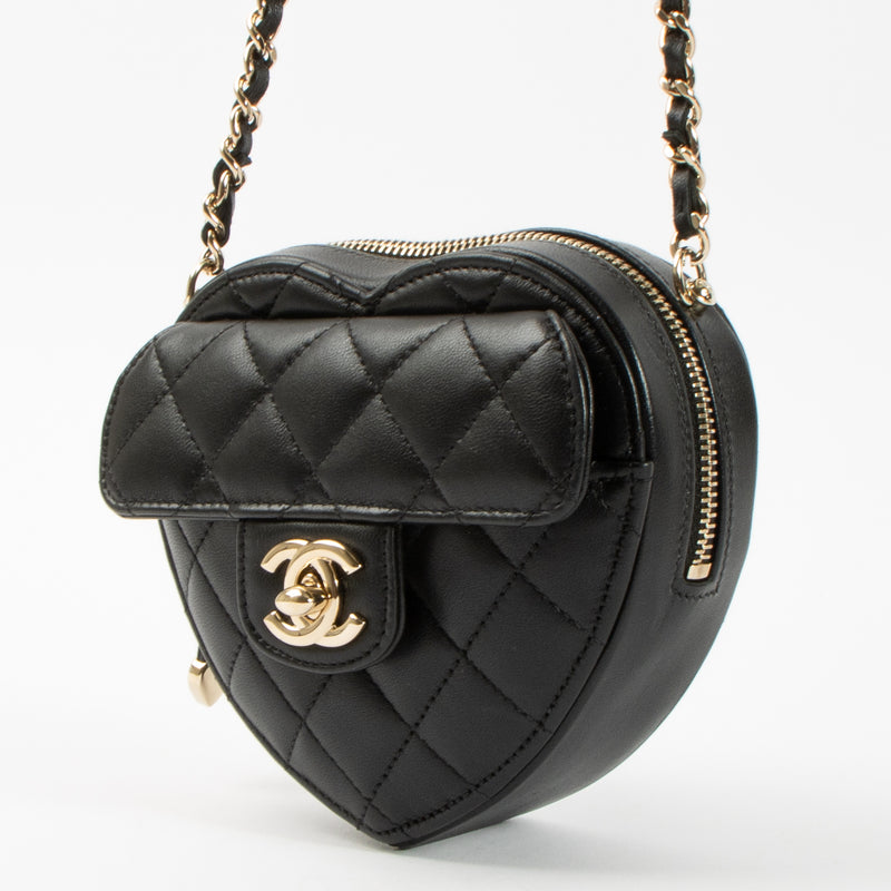 Shop this authentic Chanel Black Quilted Lambskin CC In Love Heart Clutch With Chain pre-loved on labellov.com