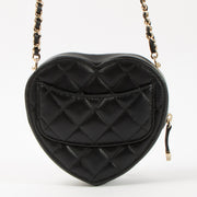 Shop this authentic Chanel Black Quilted Lambskin CC In Love Heart Clutch With Chain pre-loved on labellov.com