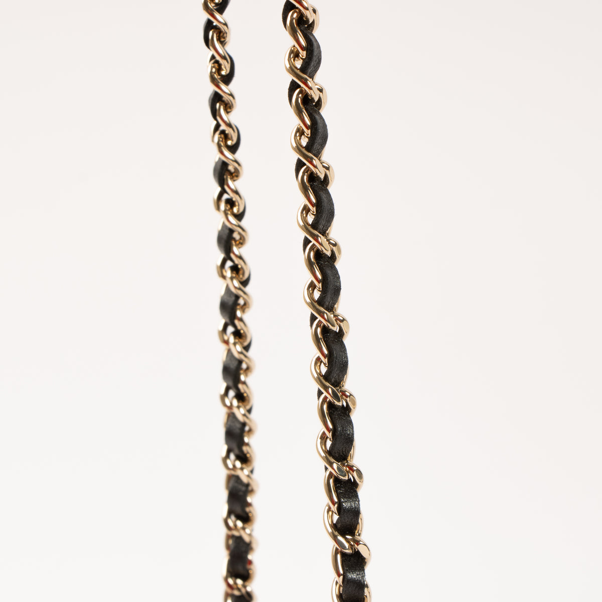 Shop this authentic Chanel Black Quilted Lambskin CC In Love Heart Clutch With Chain pre-loved on labellov.com