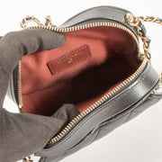 Shop this authentic Chanel Black Quilted Lambskin CC In Love Heart Clutch With Chain pre-loved on labellov.com