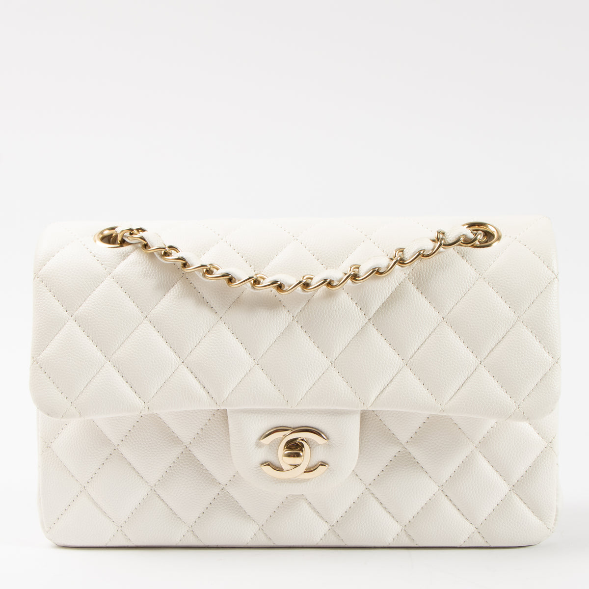 Shop this authentic Chanel White Caviar Small Classic Handbag pre-loved on Labellov.com
