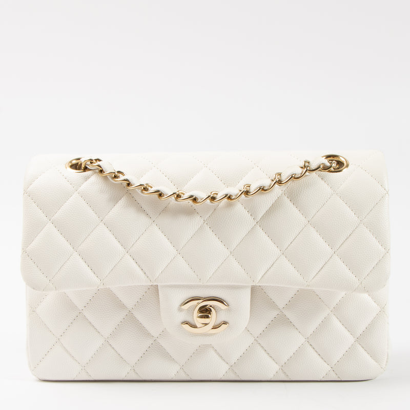 Shop this authentic Chanel White Caviar Small Classic Handbag pre-loved on Labellov.com