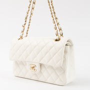 Shop this authentic Chanel White Caviar Small Classic Handbag pre-loved on Labellov.com