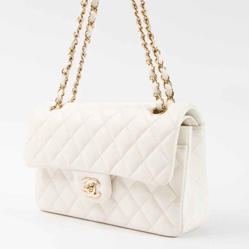 Shop this authentic Chanel White Caviar Small Classic Handbag pre-loved on Labellov.com