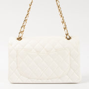 Shop this authentic Chanel White Caviar Small Classic Handbag pre-loved on Labellov.com