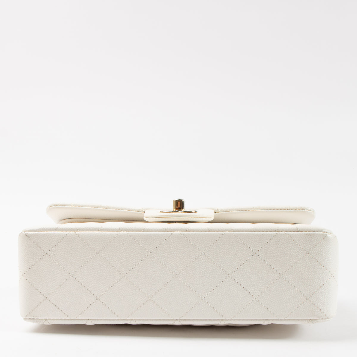 Shop this authentic Chanel White Caviar Small Classic Handbag pre-loved on Labellov.com