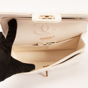 Shop this authentic Chanel White Caviar Small Classic Handbag pre-loved on Labellov.com