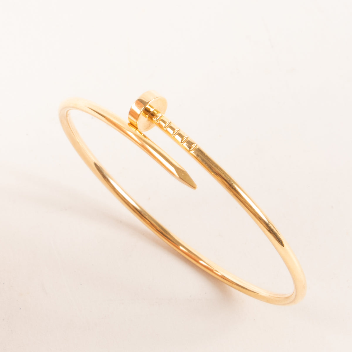 Shop this authentic luxury Cartier Rose Gold Juste un Clou Small Bracelet Pre-Loved on Labellov.com