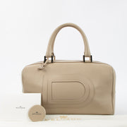 Shop this authentic Delvaux Sand Allure Louise Boston Bag pre-loved on Labellov.com