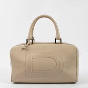 Shop this authentic Delvaux Sand Allure Louise Boston Bag pre-loved on Labellov.com