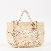 Shop this authentic luxury Chanel 24M Coco Beach Beige Raffia Small Shopping Bag pre-loved by Labellov.com