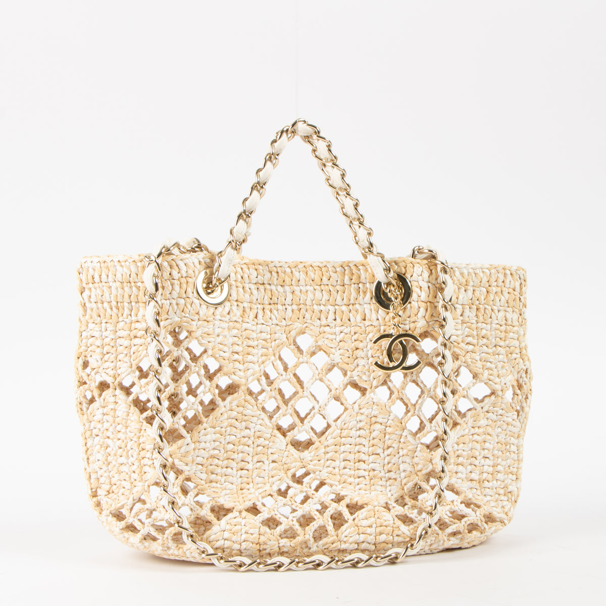 Shop this authentic luxury Chanel 24M Coco Beach Beige Raffia Small Shopping Bag pre-loved by Labellov.com