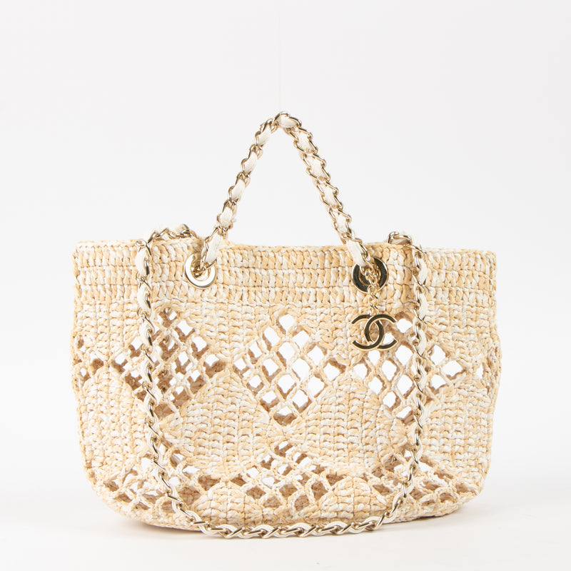 Shop this authentic luxury Chanel 24M Coco Beach Beige Raffia Small Shopping Bag pre-loved by Labellov.com
