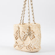 Shop this authentic luxury Chanel 24M Coco Beach Beige Raffia Small Shopping Bag pre-loved by Labellov.com