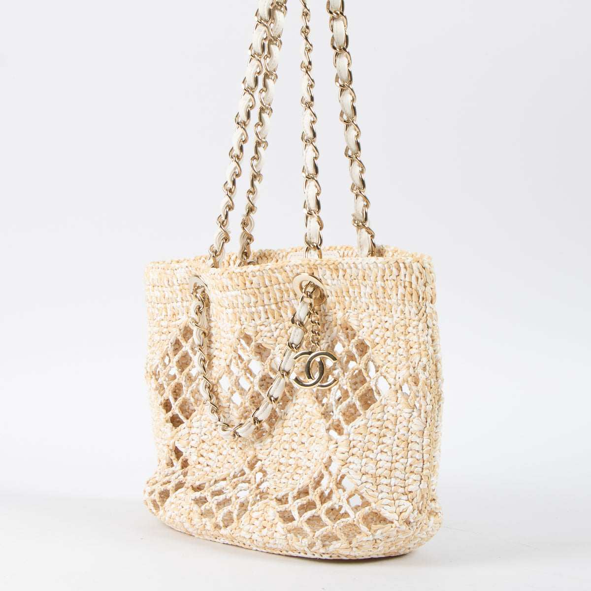 Shop this authentic luxury Chanel 24M Coco Beach Beige Raffia Small Shopping Bag pre-loved by Labellov.com