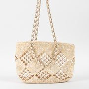 Shop this authentic luxury Chanel 24M Coco Beach Beige Raffia Small Shopping Bag pre-loved by Labellov.com