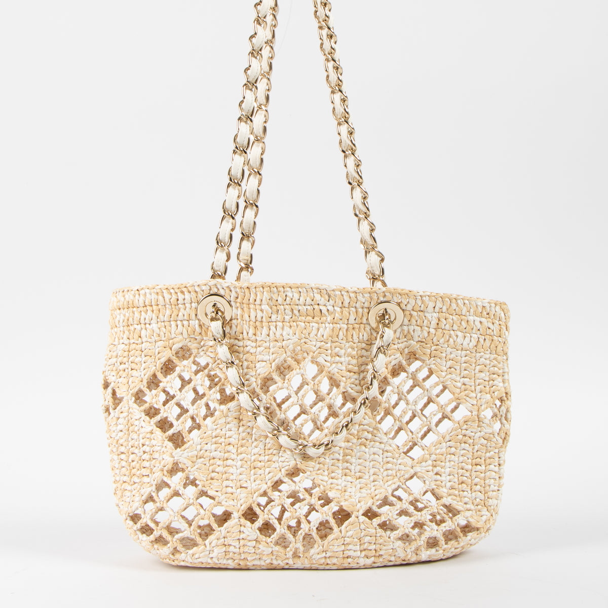 Shop this authentic luxury Chanel 24M Coco Beach Beige Raffia Small Shopping Bag pre-loved by Labellov.com