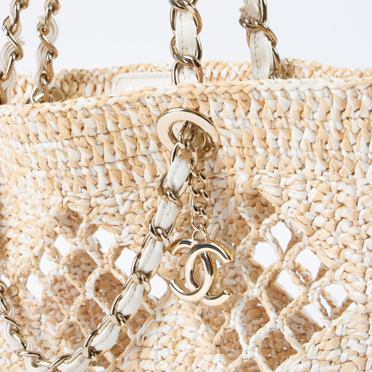 Shop this authentic luxury Chanel 24M Coco Beach Beige Raffia Small Shopping Bag pre-loved by Labellov.com