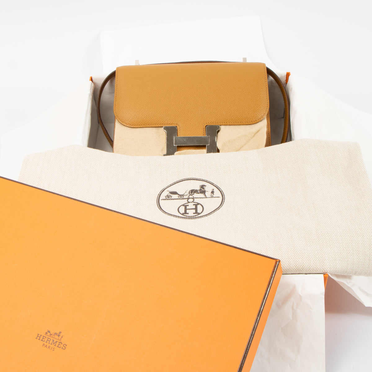 Shop this authentic Hermès Constance Mini Sesame Epsom PHW pre-loved on Labellov.com