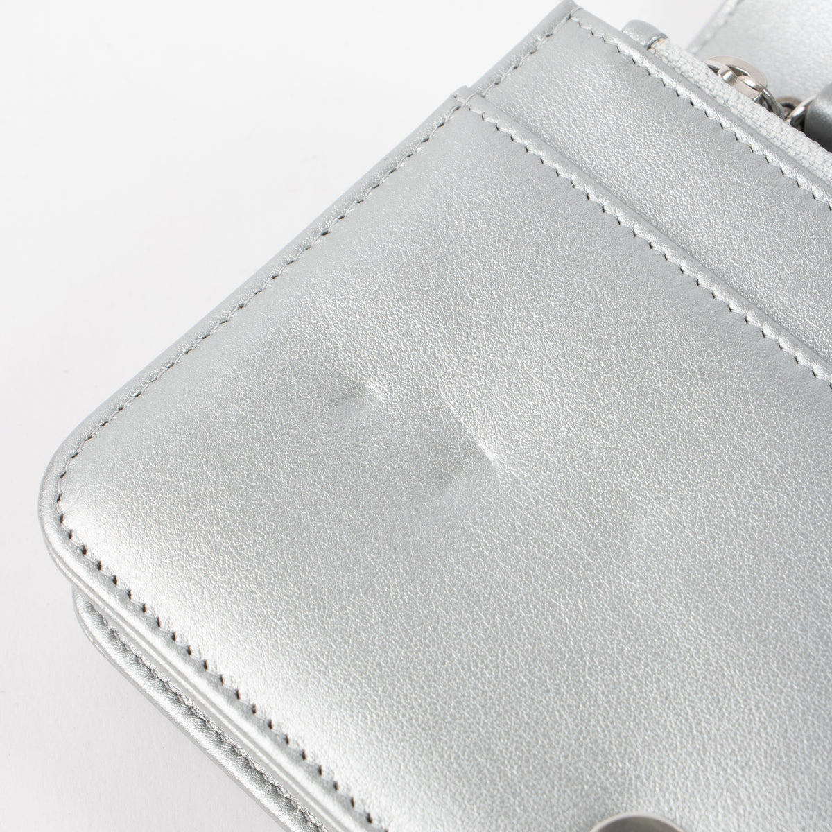 Shop this authentic Chanel Silver Diamante Crystal Camellia Quilted Wallet On Chain pre-loved on Labellov.com