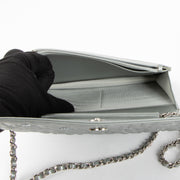 Shop this authentic Chanel Silver Diamante Crystal Camellia Quilted Wallet On Chain pre-loved on Labellov.com