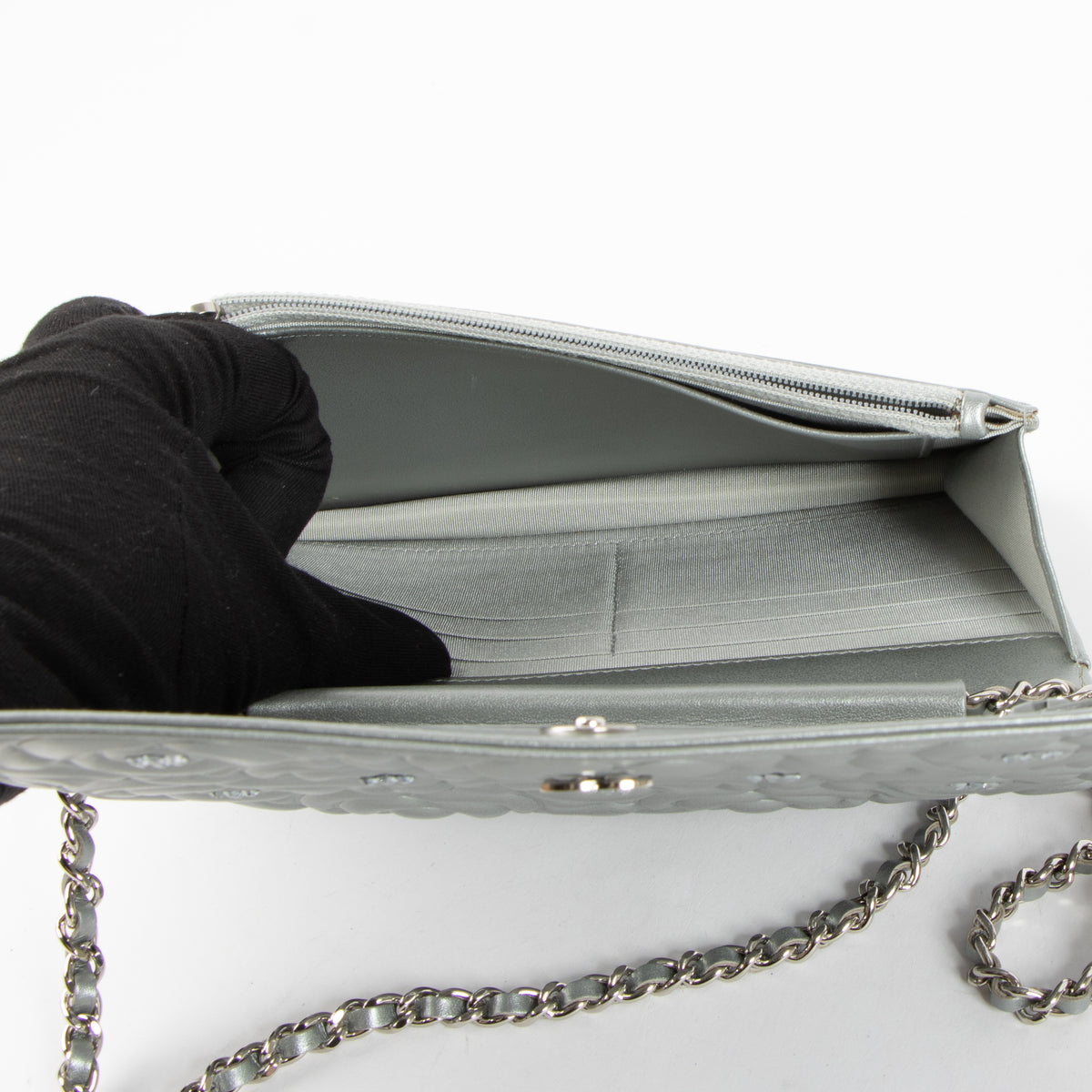 Shop this authentic Chanel Silver Diamante Crystal Camellia Quilted Wallet On Chain pre-loved on Labellov.com