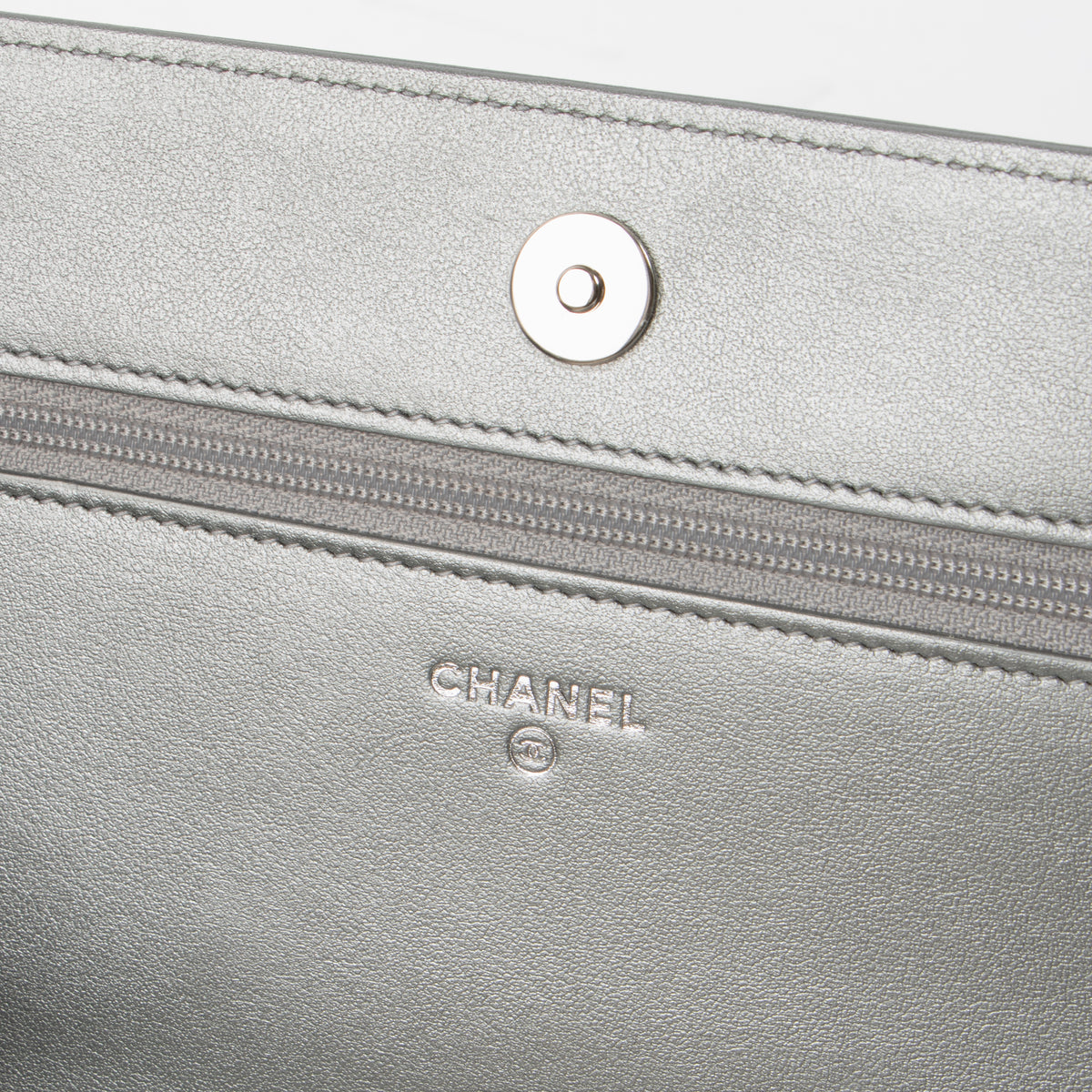 Shop this authentic Chanel Silver Diamante Crystal Camellia Quilted Wallet On Chain pre-loved on Labellov.com