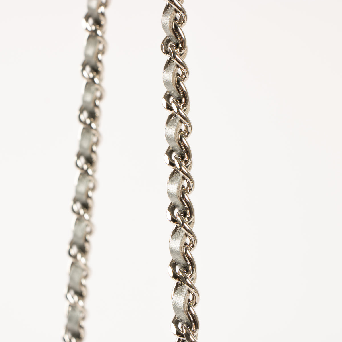Shop this authentic Chanel Silver Diamante Crystal Camellia Quilted Wallet On Chain pre-loved on Labellov.com