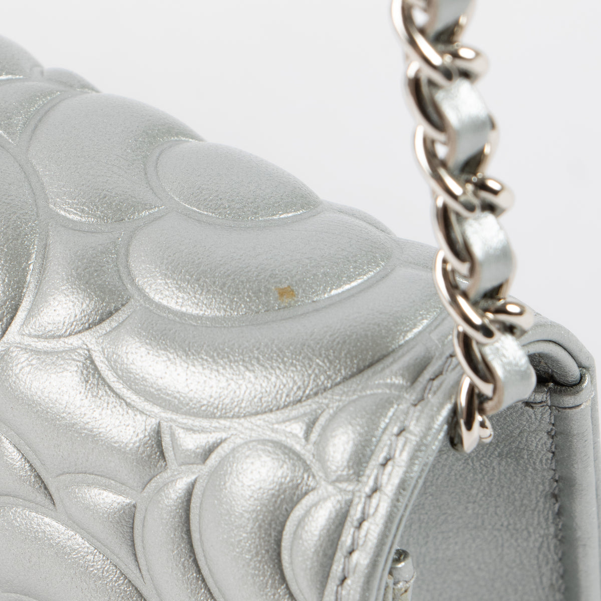 Shop this authentic Chanel Silver Diamante Crystal Camellia Quilted Wallet On Chain pre-loved on Labellov.com
