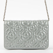 Shop this authentic Chanel Silver Diamante Crystal Camellia Quilted Wallet On Chain pre-loved on Labellov.com