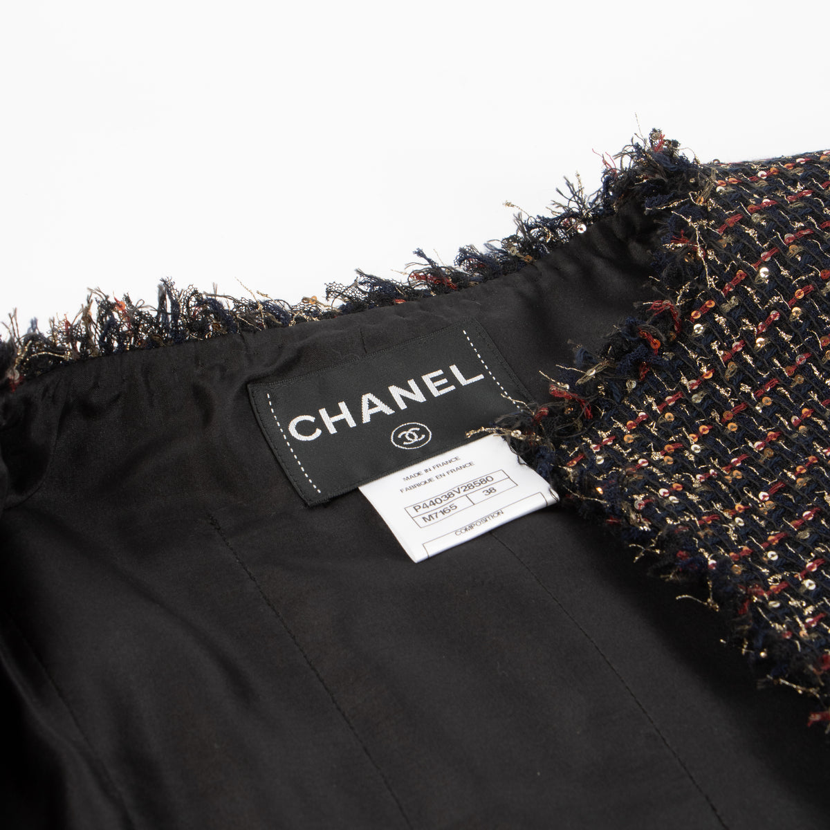 Shop this authentic Chanel 12A Paris-Bombay Black Tweed Jacket pre-loved on Labellov.com