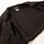 Shop this authentic Chanel 12A Paris-Bombay Black Tweed Jacket pre-loved on Labellov.com