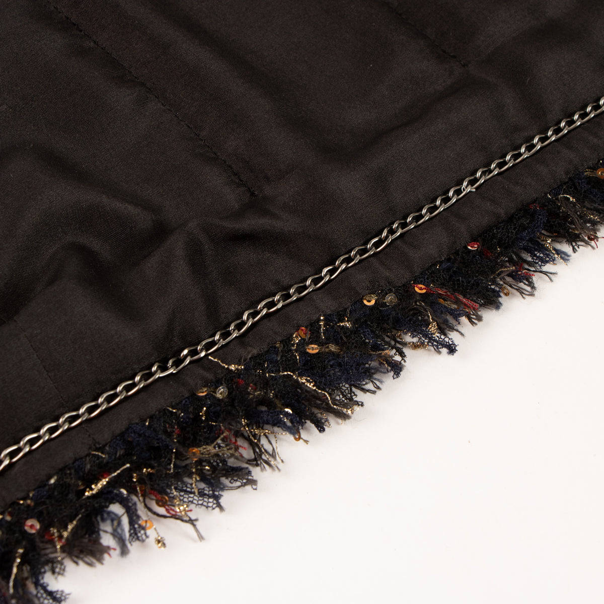 Shop this authentic Chanel 12A Paris-Bombay Black Tweed Jacket pre-loved on Labellov.com