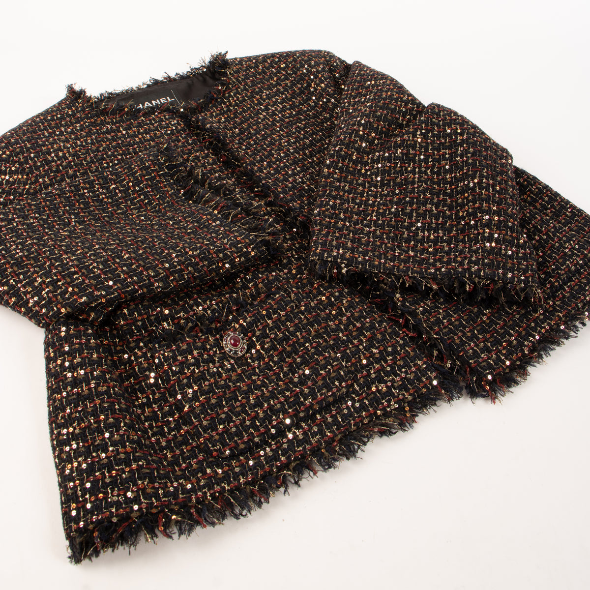 Shop this authentic Chanel 12A Paris-Bombay Black Tweed Jacket pre-loved on Labellov.com