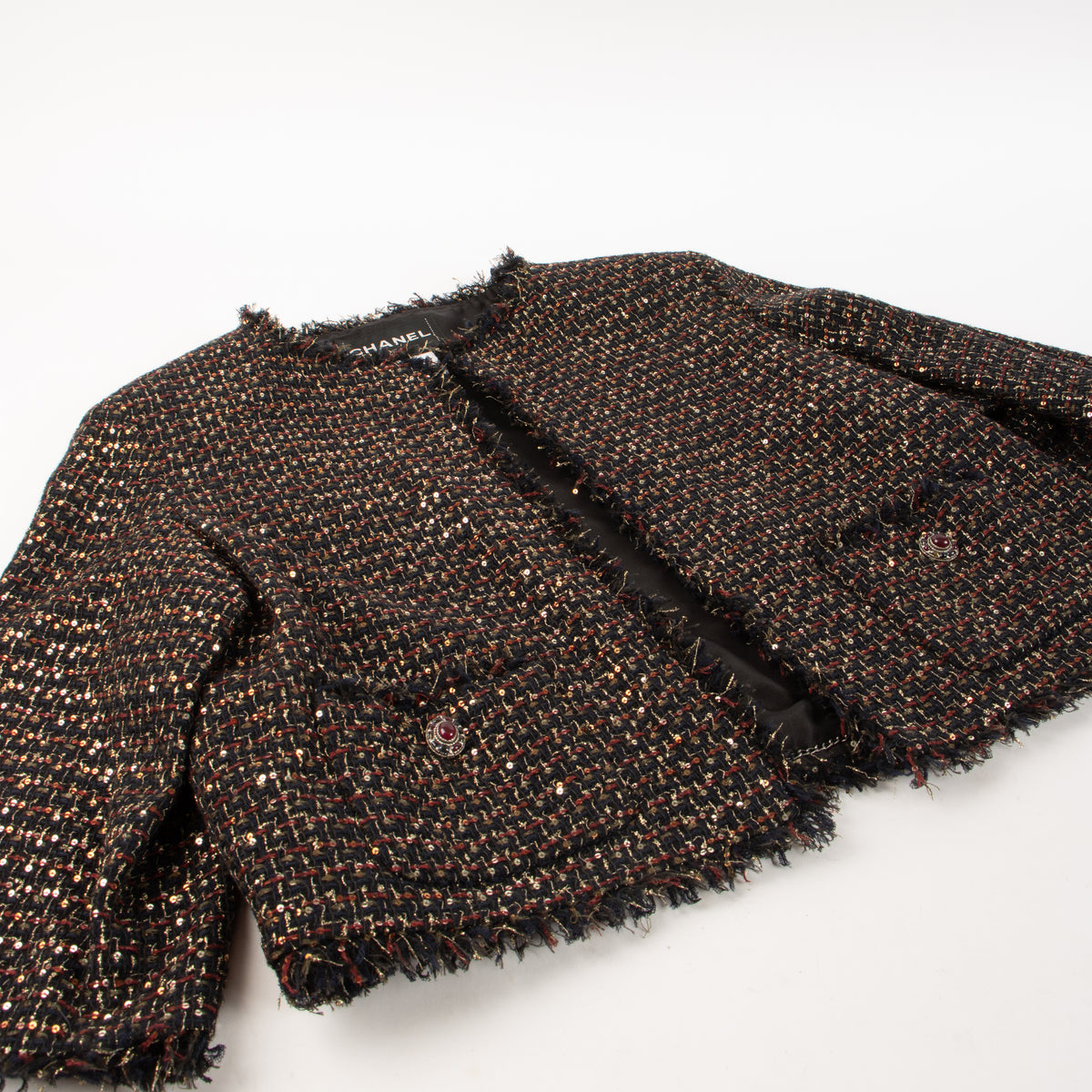 Shop this authentic Chanel 12A Paris-Bombay Black Tweed Jacket pre-loved on Labellov.com