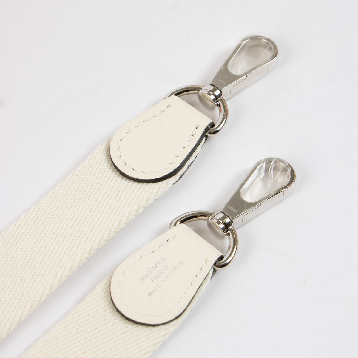Shop this authentic luxury Hermès Evelyne 16 Cream Clemence PHW Pre-Loved on Labellov.com