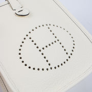 Shop this authentic luxury Hermès Evelyne 16 Cream Clemence PHW Pre-Loved on Labellov.com