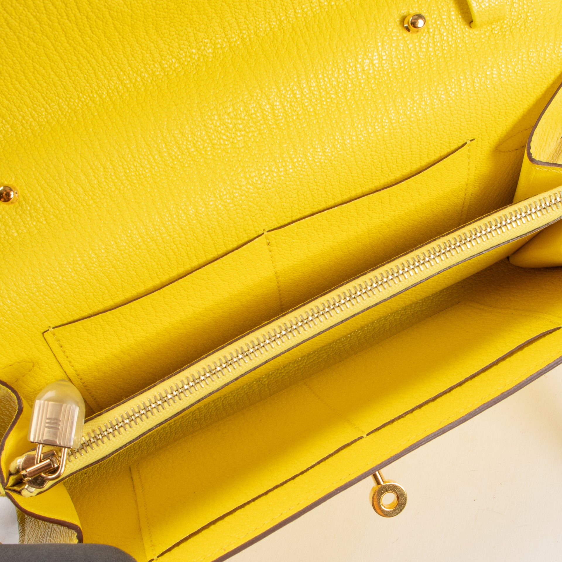 Shop the authentic Hermès Kelly To Go Jaune de Naples Chèvre Mysore on Labellov.com !